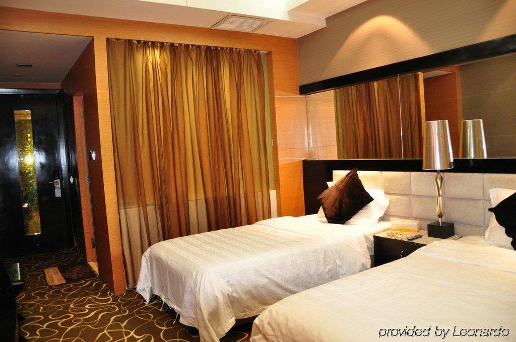 Harbin Yakelai Holiday Hotel Zimmer foto