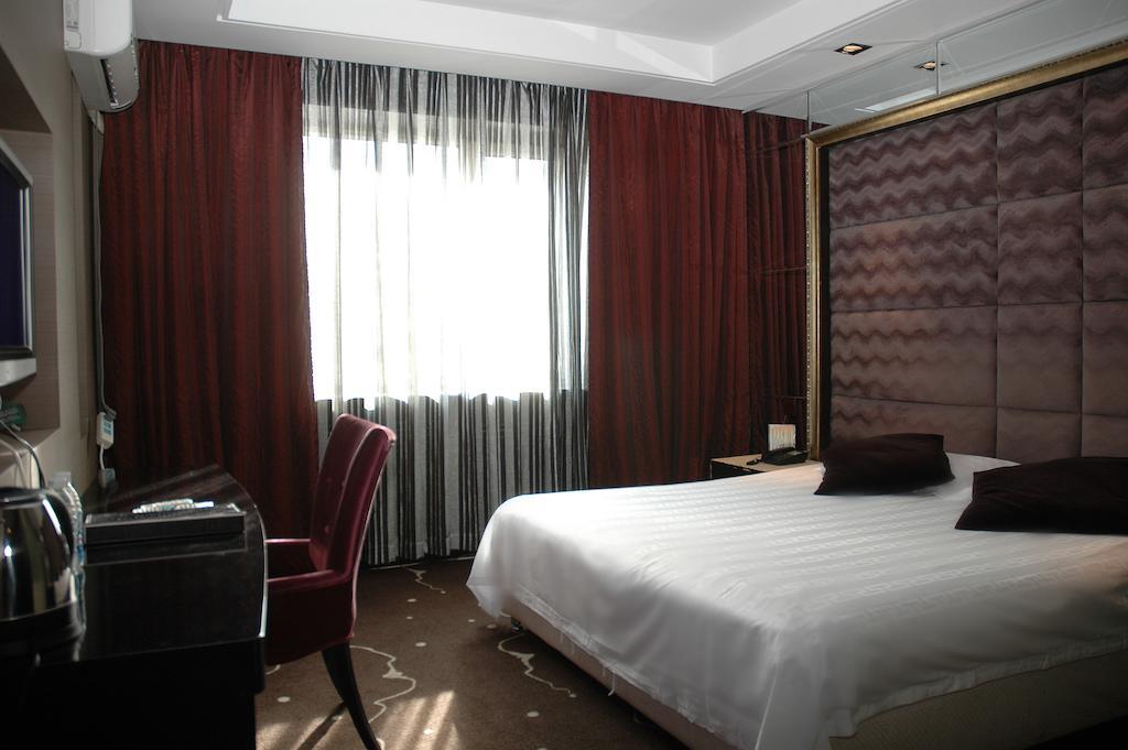 Harbin Yakelai Holiday Hotel Zimmer foto
