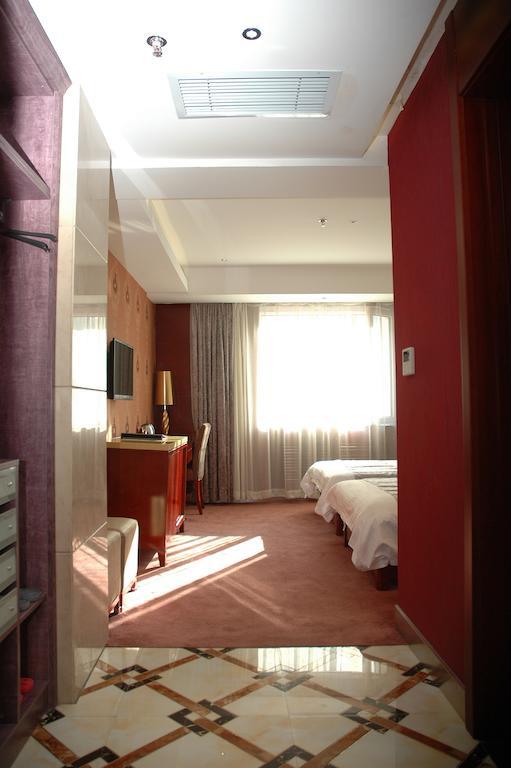 Harbin Yakelai Holiday Hotel Zimmer foto