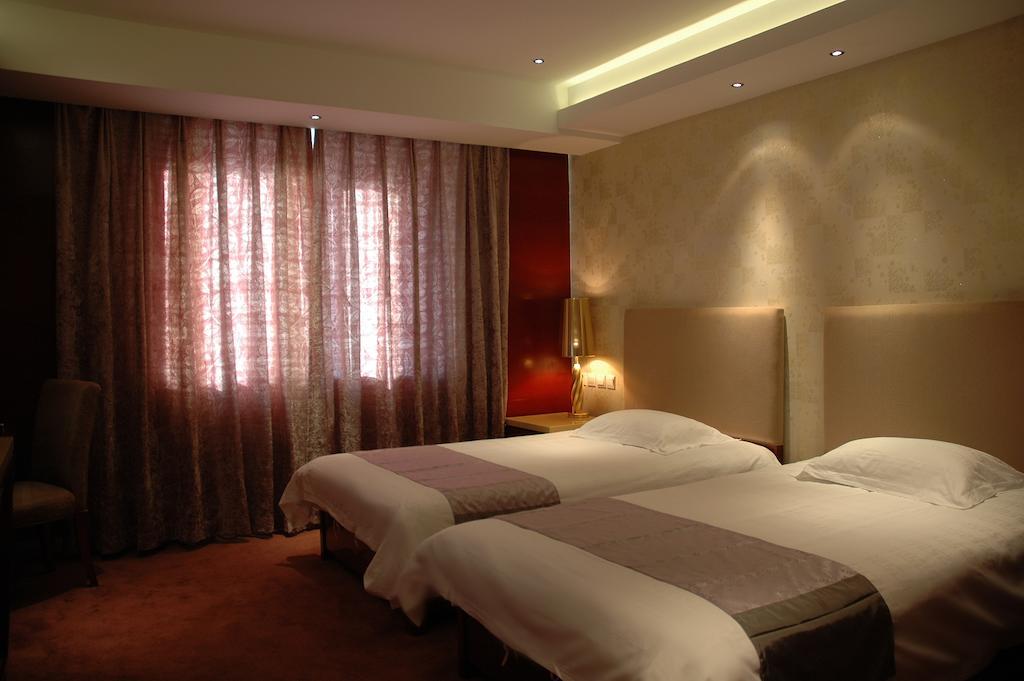 Harbin Yakelai Holiday Hotel Zimmer foto