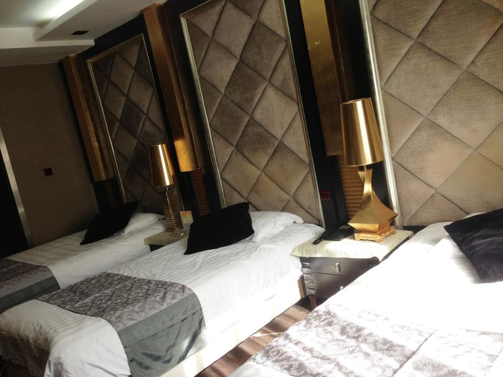 Harbin Yakelai Holiday Hotel Zimmer foto