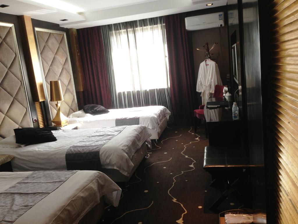Harbin Yakelai Holiday Hotel Zimmer foto