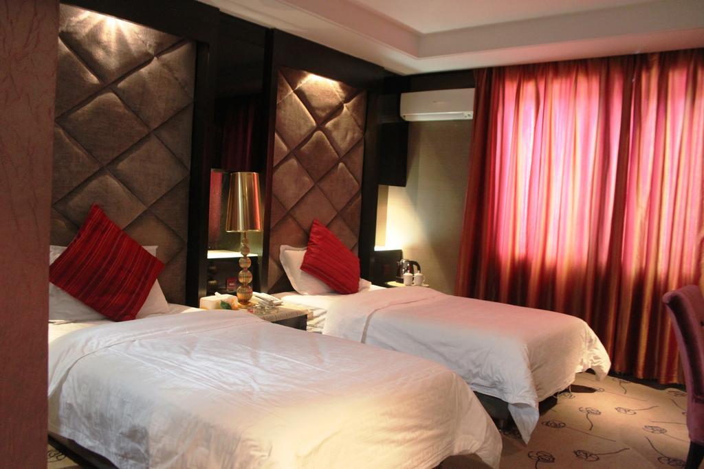 Harbin Yakelai Holiday Hotel Zimmer foto