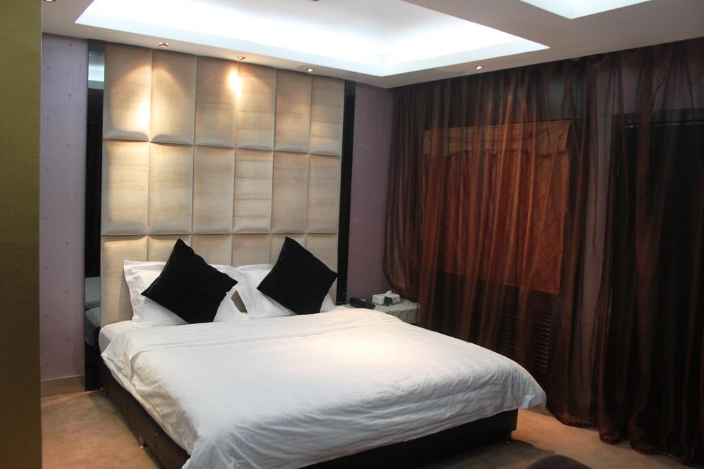 Harbin Yakelai Holiday Hotel Zimmer foto
